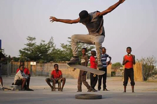 Young people skating in Zambia