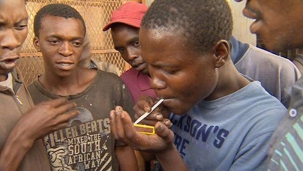 Ghanaian youth smoking faecses