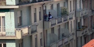 Italians sing from window